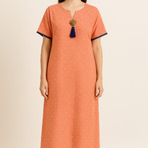 Coral kaftan dress with tassel brooch
